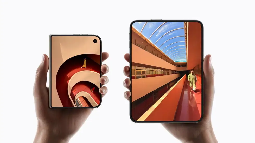 Two hands hold up iPhone Duo devices displaying the 5.4-inch folded outer screen and 7.6-inch unfolded inner screen