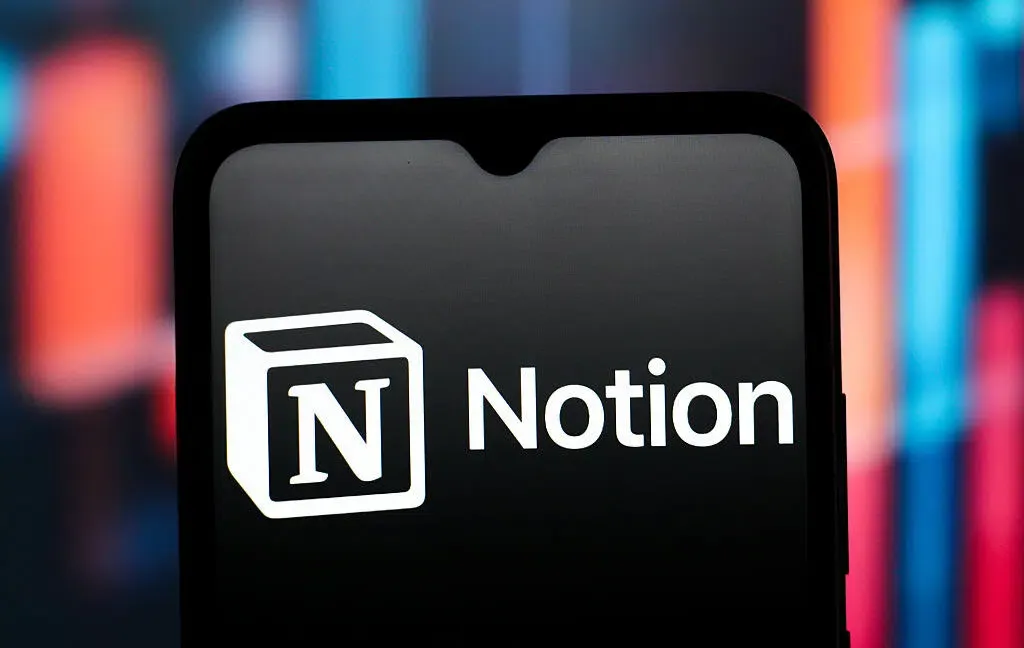 Notion logo displayed on mobile device illustrating corporate pivot toward agentic SaaS ecosystems